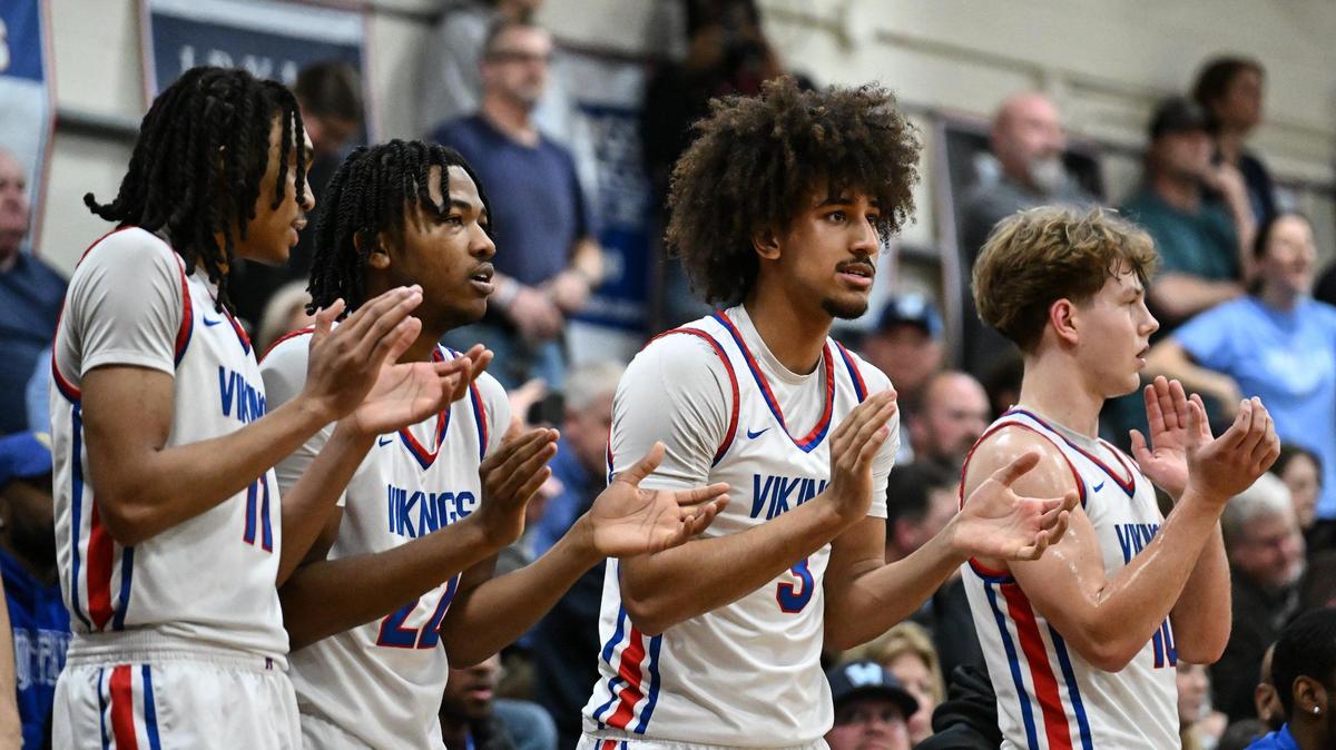 North Mecklenburg reacts during the first half of a NCHSAA boys basketball state quarterfinal game against Watauga Friday, March 7, 2025, in Huntersville, N.C. (Charlotte Observer/Matt Kelley)
