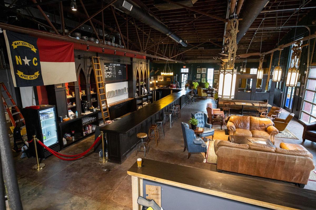 Petty Thieves Brewery offers bar seating and couches in three distinct areas.
