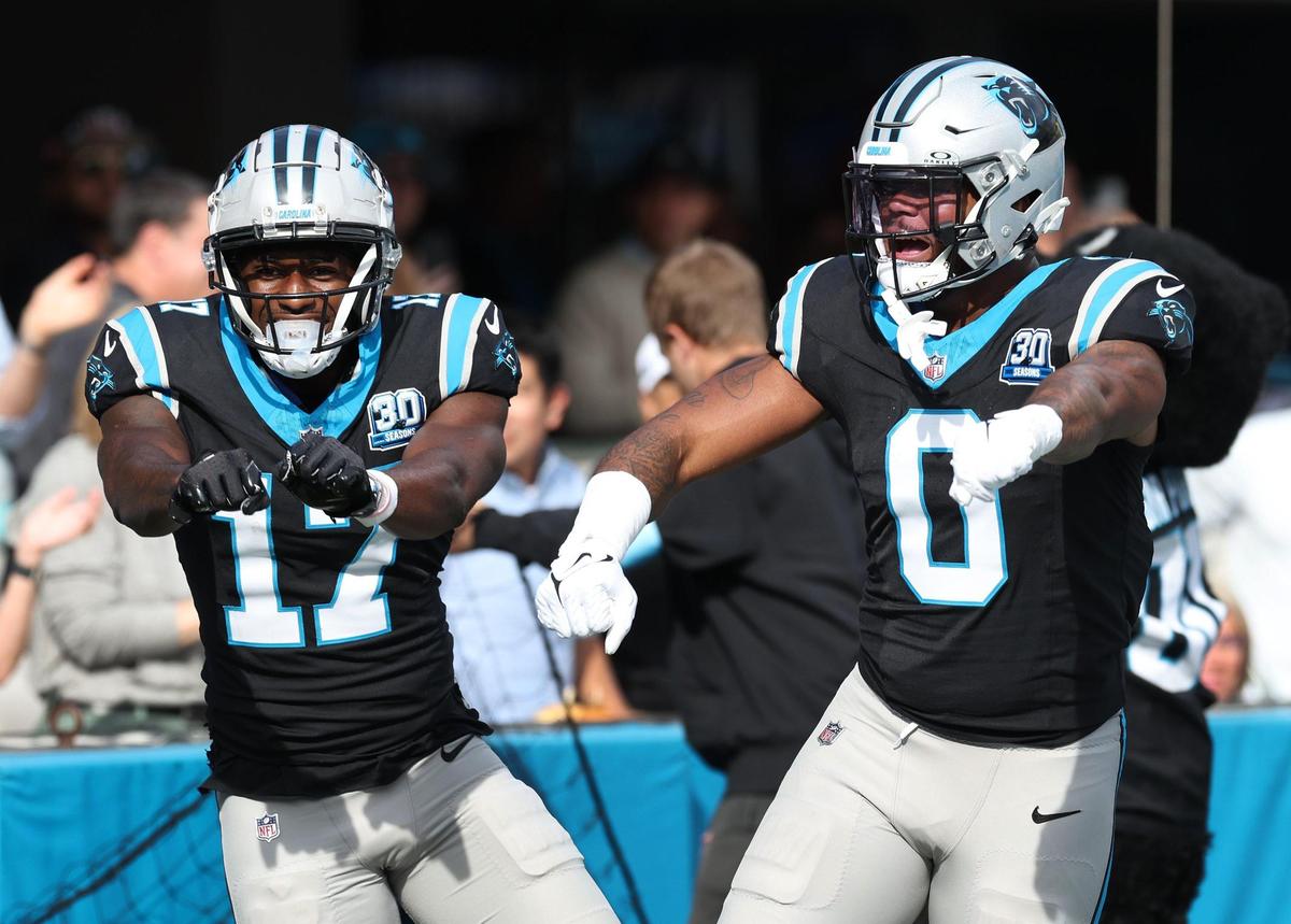 Carolina Panthers wide receiver Xavier Legette, left, and teammate and tight end Ja’Tavion Sanders, right, celebrate Legette’s touchdown pass reception against the New Orleans Saints on Sunday, November 3, 2024.