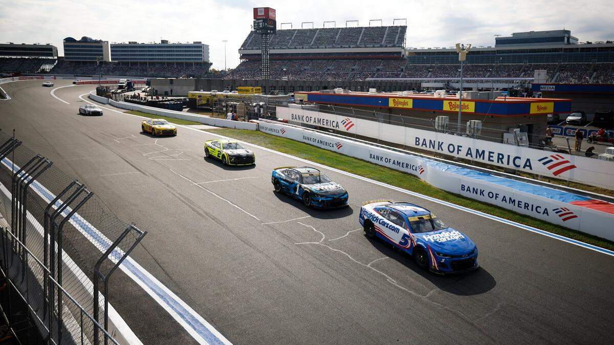 NASCAR Cup Series driver Kyle Larson (5) leads a group out of a turn during the Bank of America Roval 400 at Charlotte Motor Speedway in Charlotte, N.C., Sunday, Oct. 9, 2022.