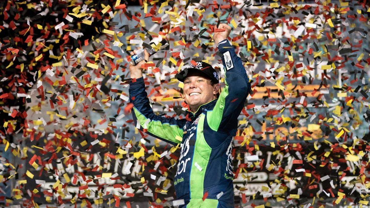 Erik Jones celebrates in the Winner’s Circle after the NASCAR Southern 500 auto race Sunday, Sept. 4, 2022, in Darlington, S.C. Jones held on to the victory after taking the lead from Kyle Busch, who blew a motor with 30 laps remaining. (AP Photo/Sean Rayford)
