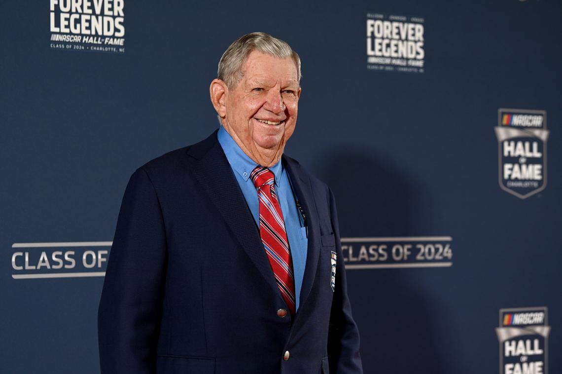 NASCAR Hall of Fame member Donnie Allison poses for photographs along the red carpet at the NASCAR Hall of Fame in Charlotte, NC on Friday, January 19, 2024.
