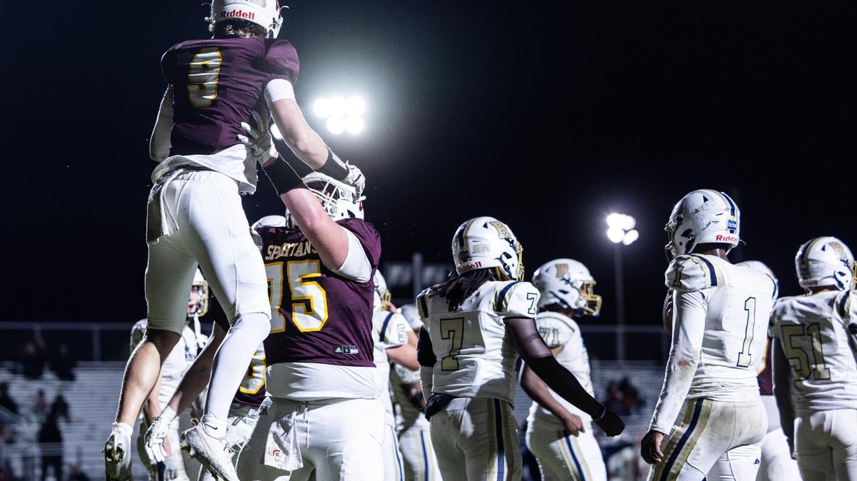 Sun Valley Spartans celebrate a touchdown against the T.C. Roberson Rams at Sun Valley High School in Monroe, N.C., on Friday, November 15, 2024.