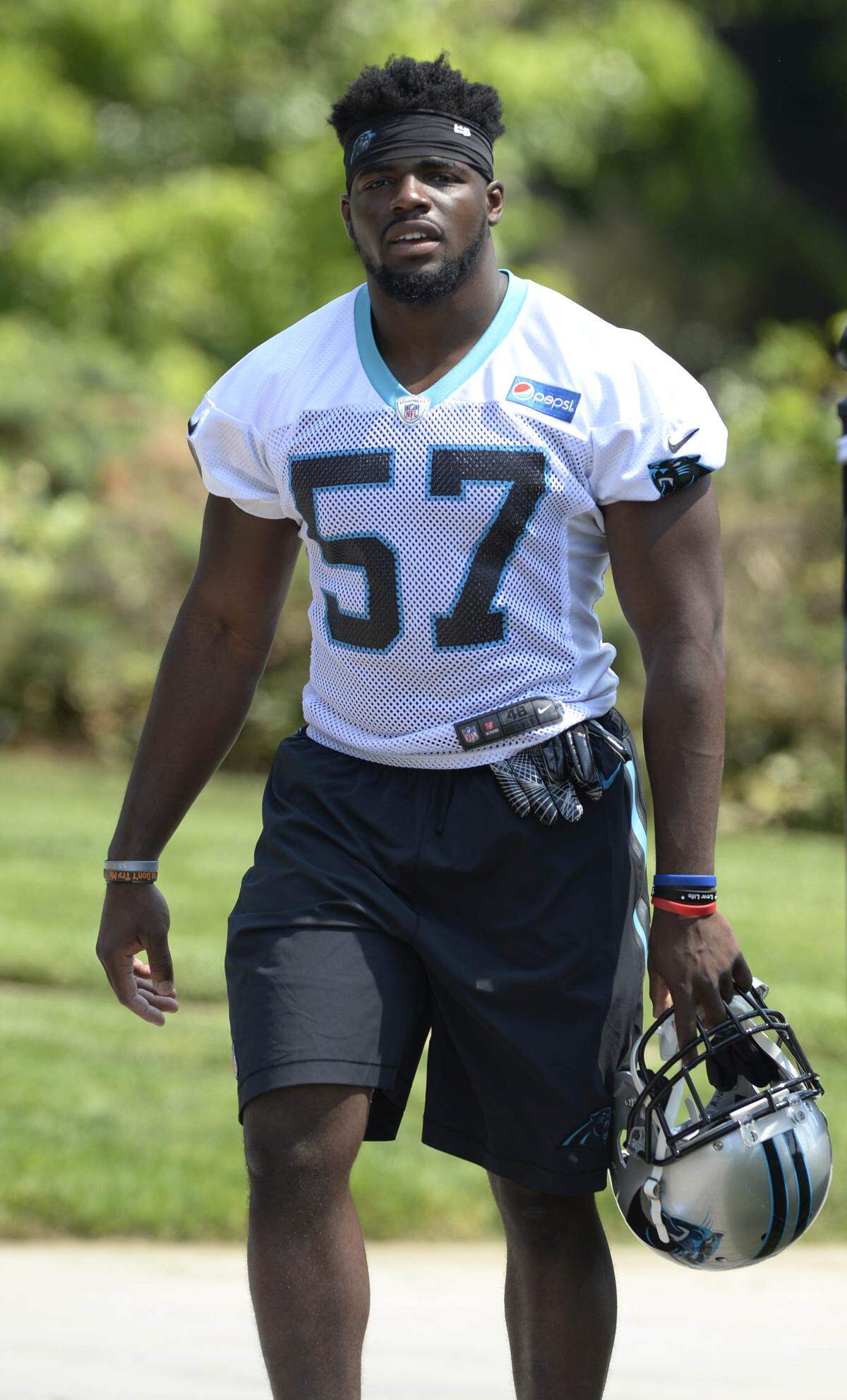 Former North Carolina star Andre Smith is among three Carolina Panthers rookie linebackers, all either late-round draft picks or undrafted free agents, who have already made an impression on All-Pro Luke Kuechly and head coach Ron Rivera.