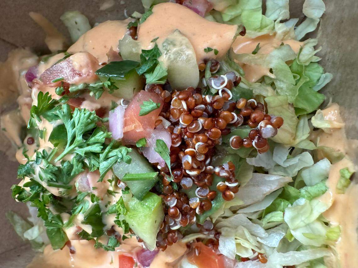 Kid Cashew’s&nbsp;Quinoa Stuffed Avocado includes&nbsp;cucumber salsa and shredded lettuce with chipotle sauce. 