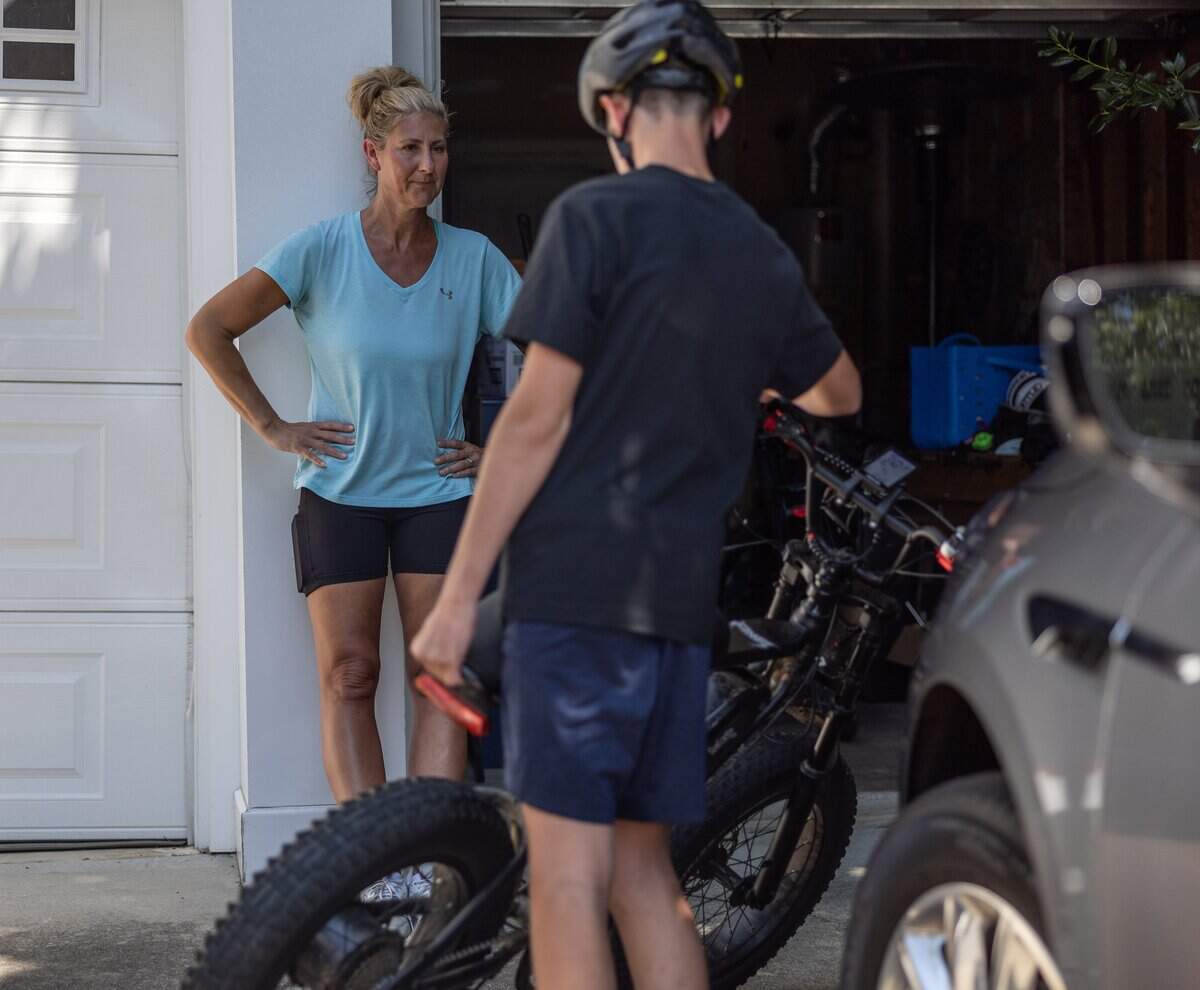 Azu Fuller, left, tries not to worry every time her son Cam gets ready to head out on his bike. But she says it probably won’t ever completely go away.