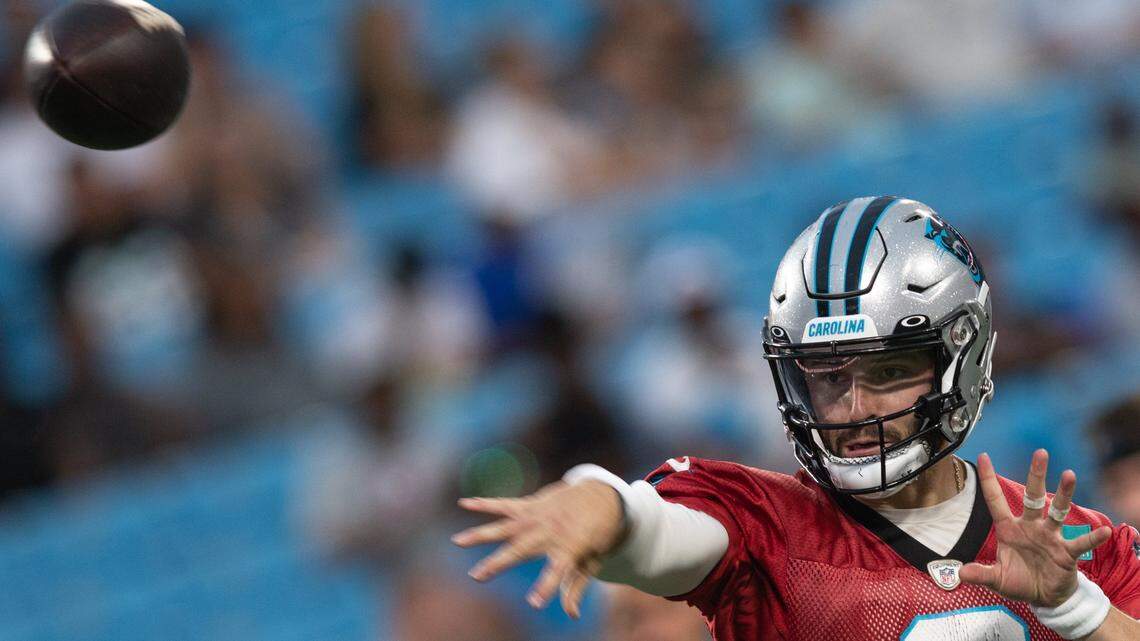 Carolina Panthers quarterback Baker Mayfield (6) throws a pass during Fan Fest at Bank of America Stadium on Aug. 11, 2022, in Charlotte, N.C. Mayfield was named the Panthers’ starting quarterback on Monday.