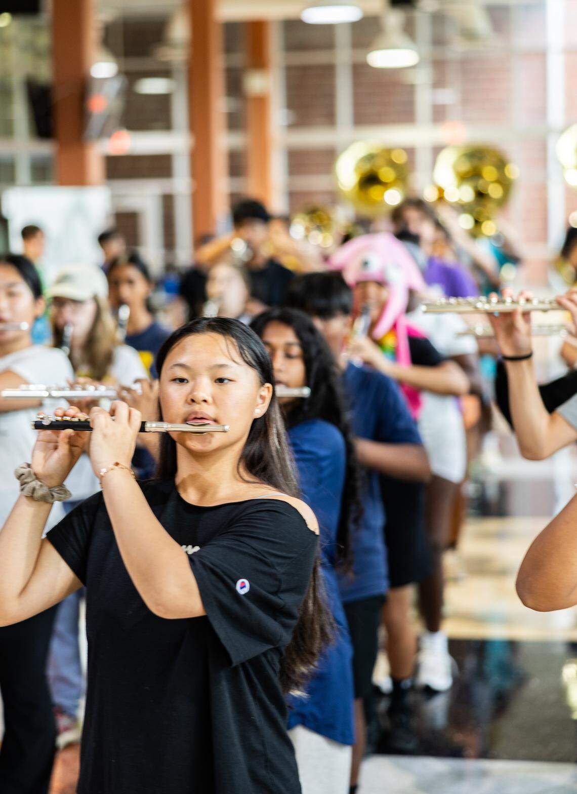 The Ardrey Kell marching band practices during band camp at Ardrey Kell High School in Charlotte, N.C., on Wednesday, August 6, 2025.