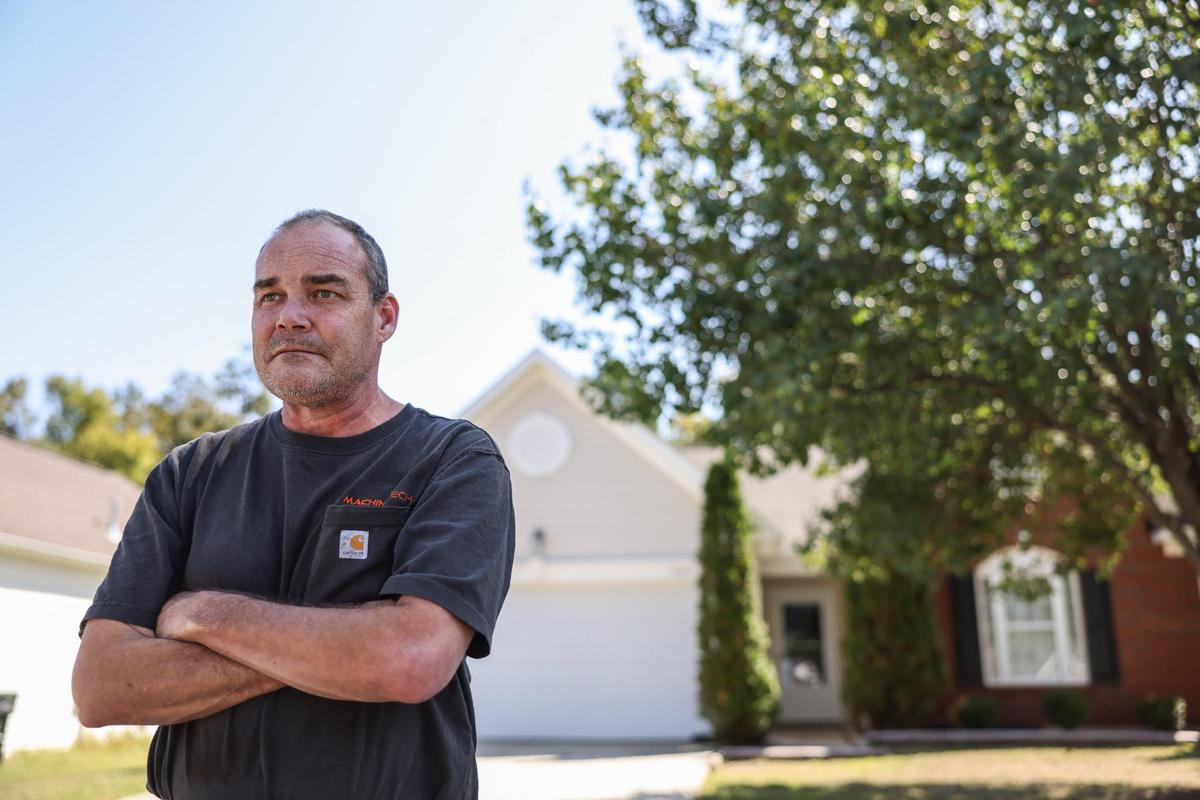 Eric Peper stands outside the Charlotte house that he lost after his HOA foreclosed on him. Now he’s renting a room in someone else’s house. “I had my nice little house and everything was all good,” he said. “And all of a sudden. Bam.”