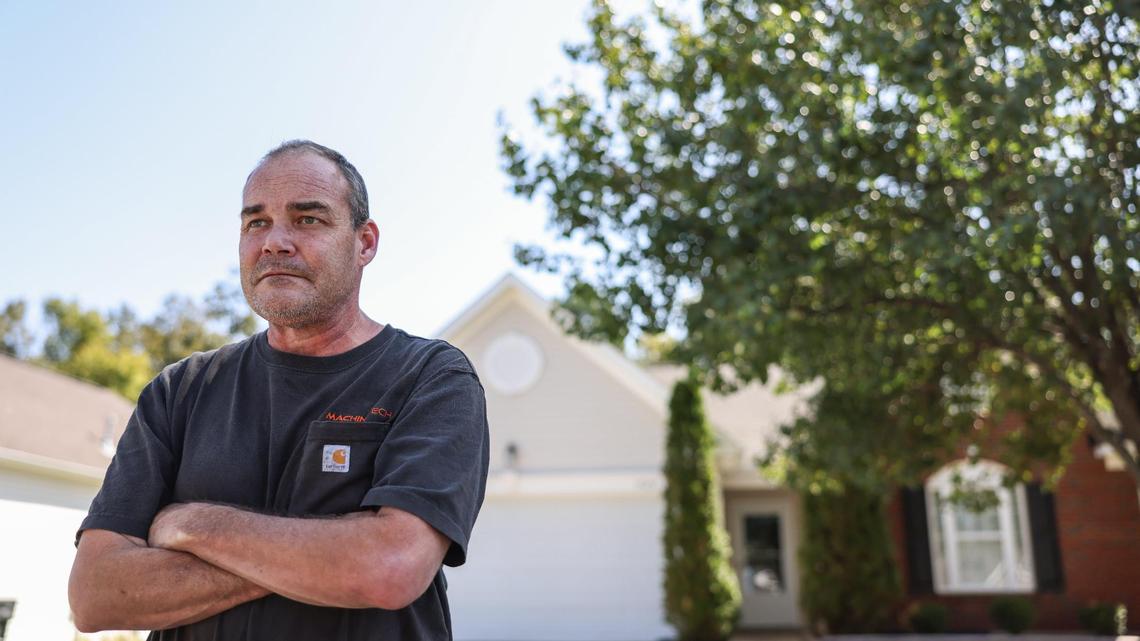 Eric Peper stands outside the Charlotte house that he lost after his HOA foreclosed on him. Now he’s renting a room in someone else’s house. “I had my nice little house and everything was all good,” he said. “And all of a sudden. Bam.”