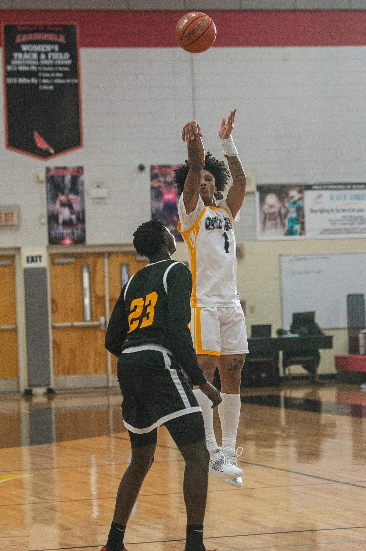 Vertical Academy guard Mikey Williams shoots from the three-point line. Williams is a 6-foot-2 combo guard who moved to Charlotte before his sophomore basketball season.