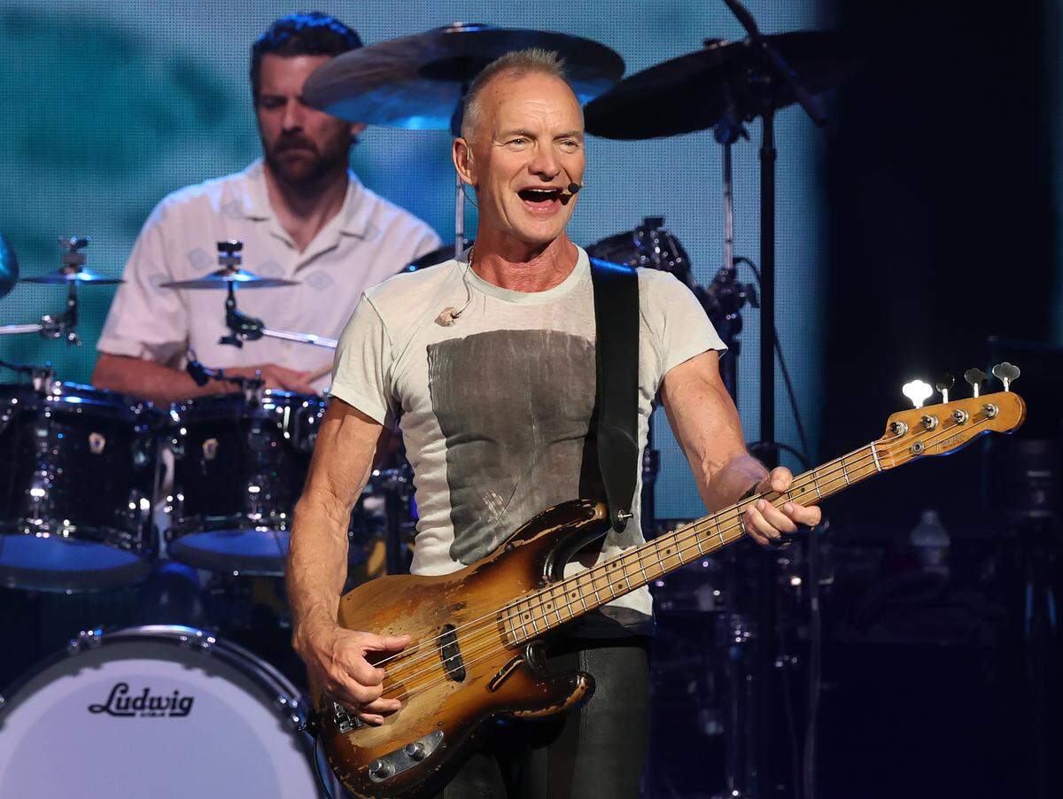Sting performs during his “Sting 3.0” tour at Truliant Amphitheater in Charlotte on Monday night.