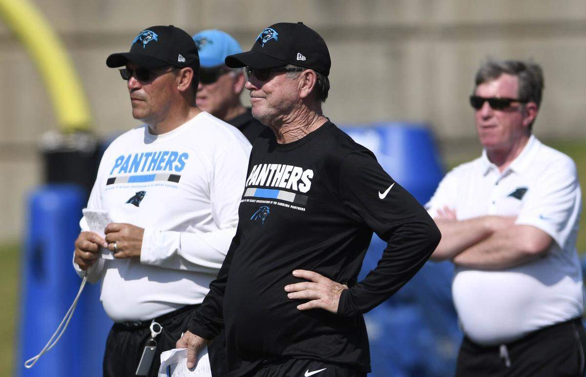 After a year off, Carolina Panthers offensive coordinator Norv Turner, center, returns to football with the hope of revitalizing the team's offense.