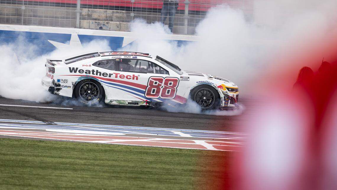 NASCAR Cup Series driver Shane van Gisbergen (88) celebrates winning the Bank of America Roval 400 with a burnout on Sunday, Oct. 5, 2025, at Charlotte Motor Speedway.