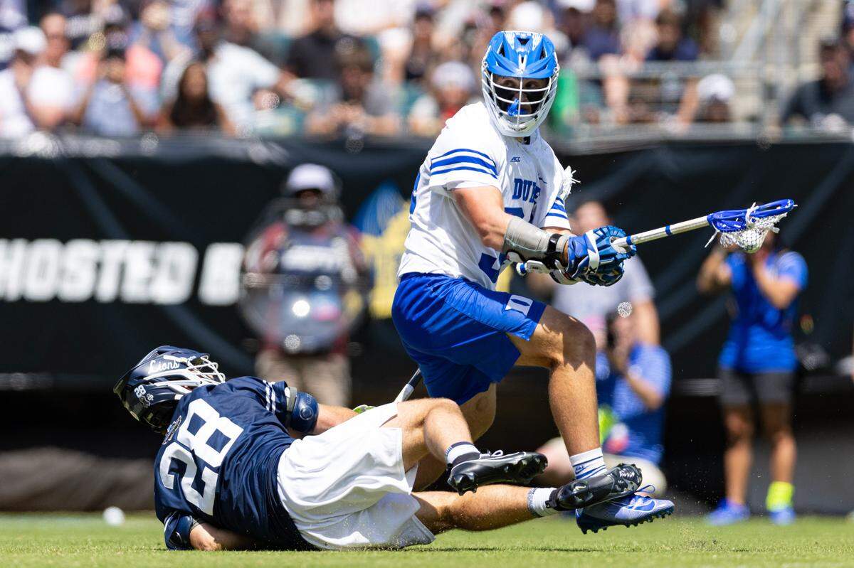 Duke Blue Devils attack Brennan O’Neill (34) controls the ball against Penn State Nittany Lions defender Will Costin (28) at Lincoln Financial.