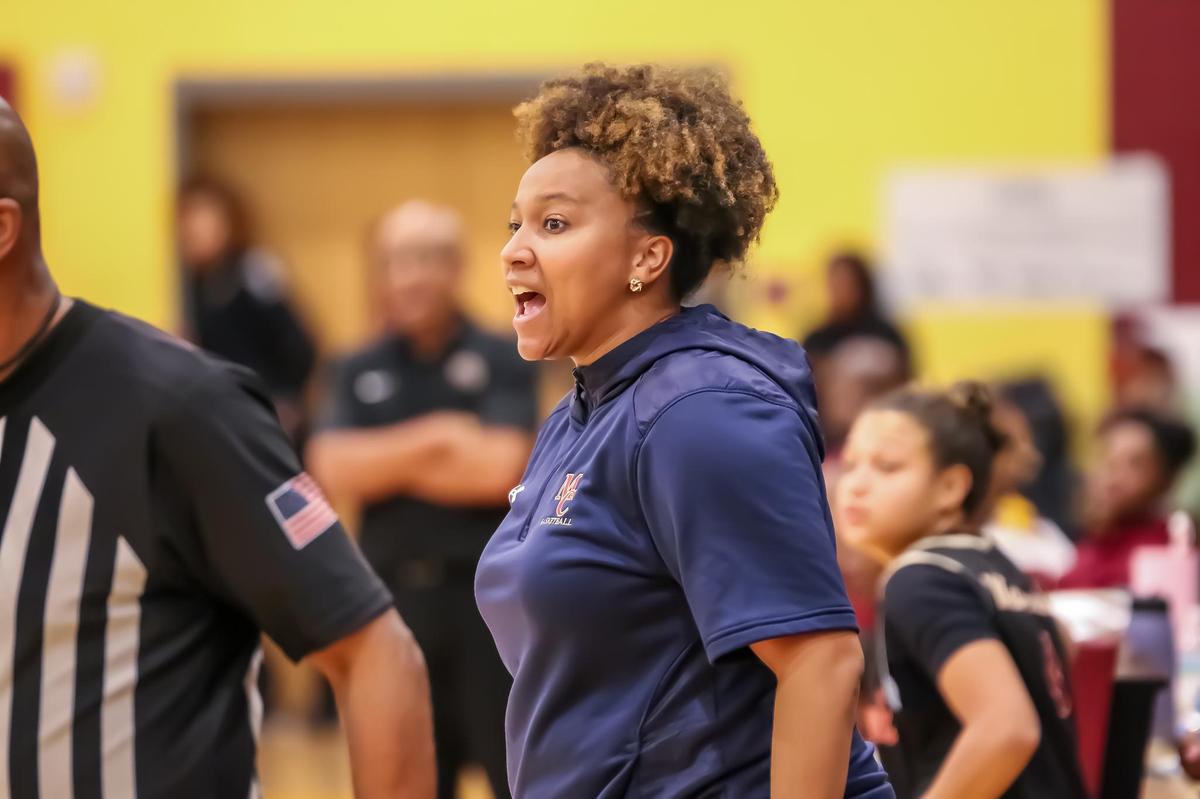Mallard Creek head coach Carlyn Dixon yells to her team from the sideline for her players to get back to help break West Charlottes full Court press in the third quarter at West Charlotte high school in Charlotte, N.C., on t, December 17th, 2024.