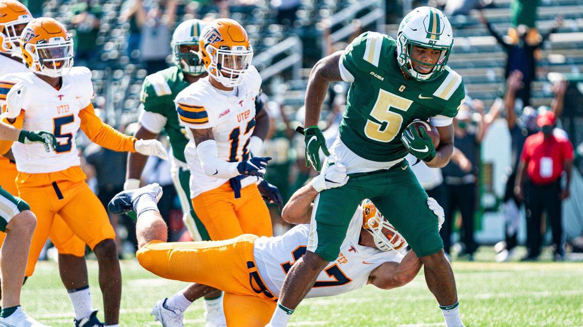 Charlotte 49ers running back Aaron McAllister (5) scores a touchdown during an NCAA football game on Saturday, Oct. 24, 2020, in Charlotte, N.C. (AP Photo/Jacob Kupferman)
