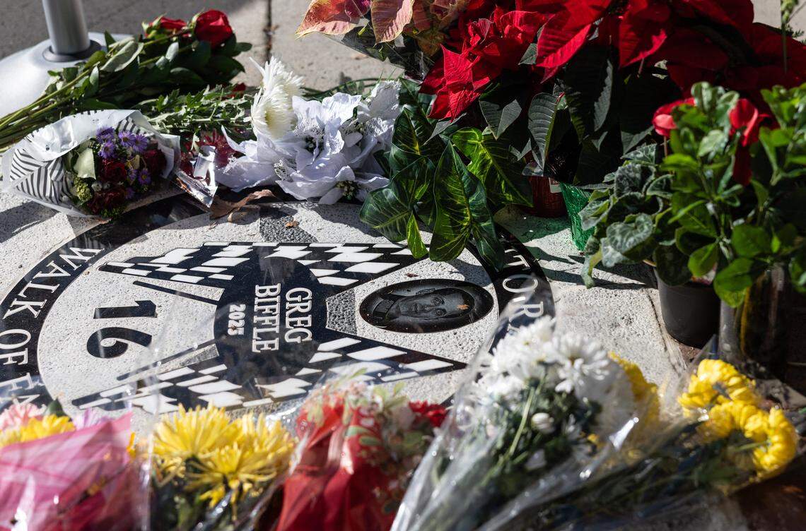 Greg Biffle's North Carolina Auto Racing Walk of Fame marker is turned in a memorial on Dec. 19, 2025, on North Main Street in Mooresville.