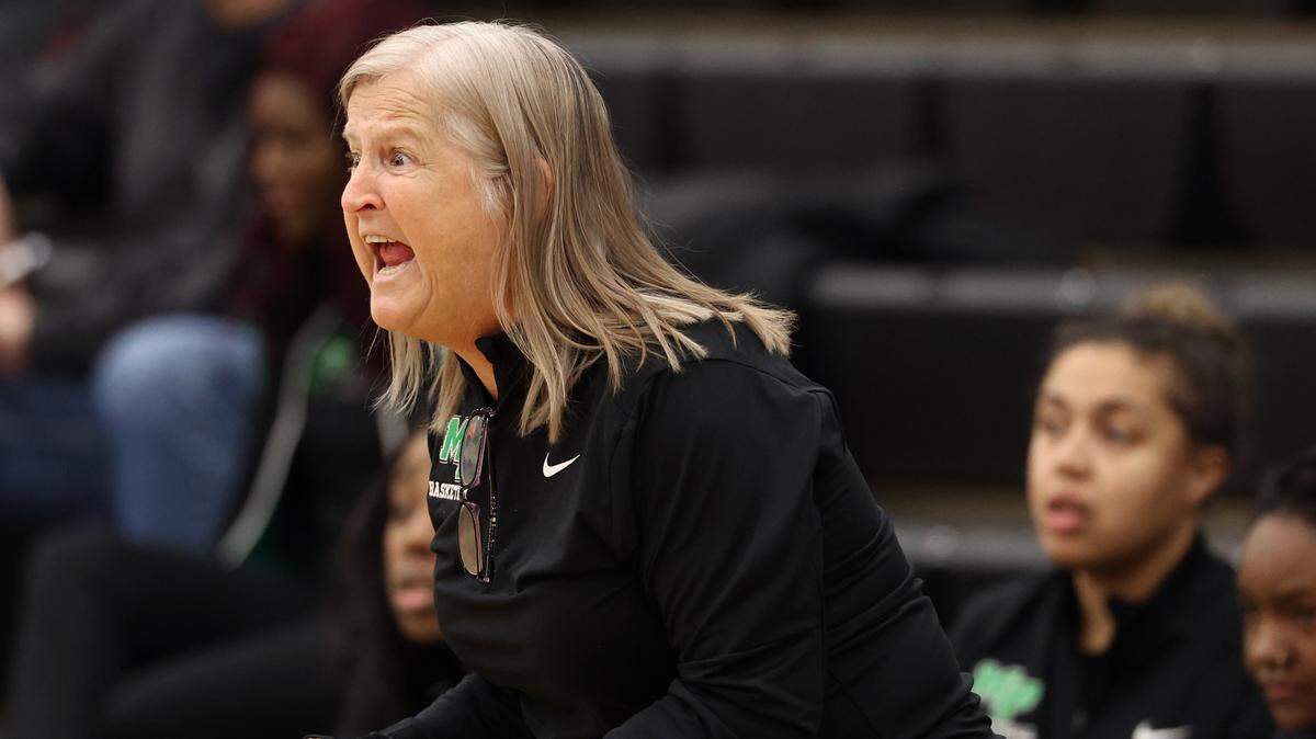 Myers Park girls basketball coach Barbara Nelson yells instructions to her team during half action against South Meck on Friday, January 17, 2025 at Myers Park High in Charlotte, NC.