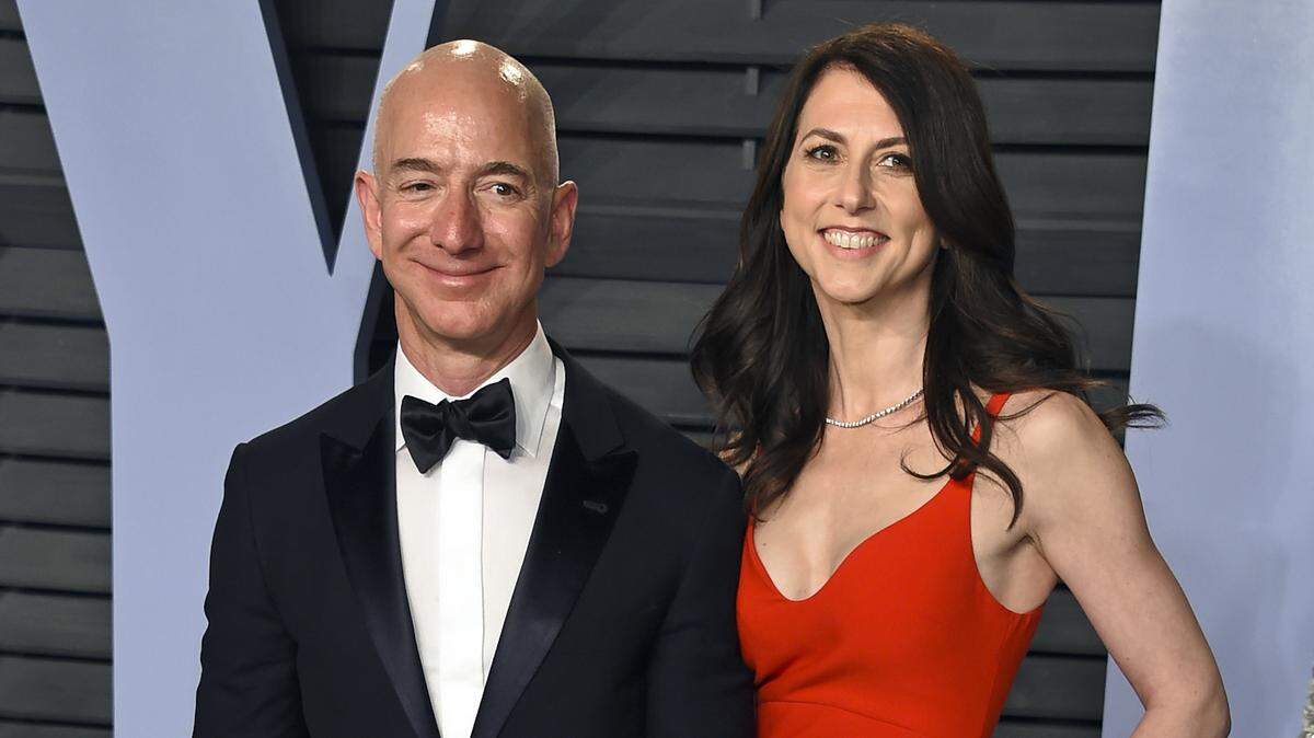 In this March 4, 2018, file photo, Jeff Bezos and wife MacKenzie Bezos arrive at the Vanity Fair Oscar Party in Beverly Hills, Calif. The founder of Amazon and his wife have made their largest political donation to date, giving $10 million to With Honor, a nonpartisan political-action committee devoted to helping military veterans running for Congress.