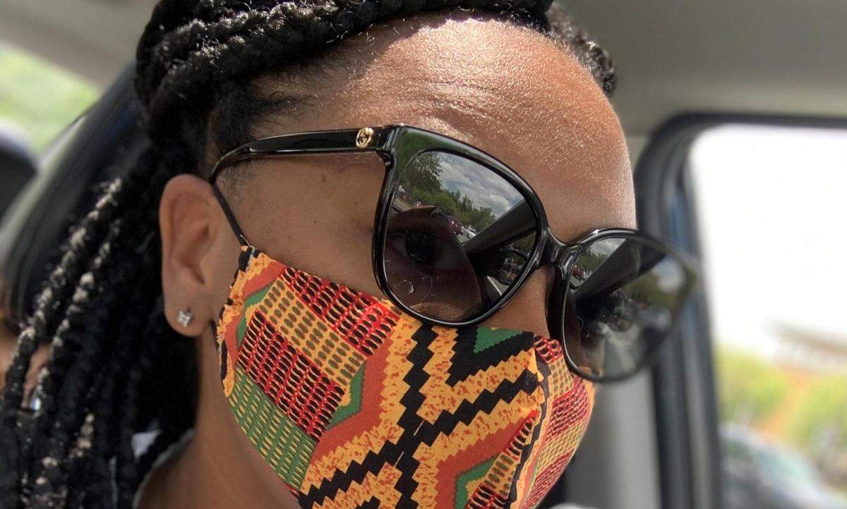Jerra Cook is a seamstress who makes and sells masks in Charlotte.