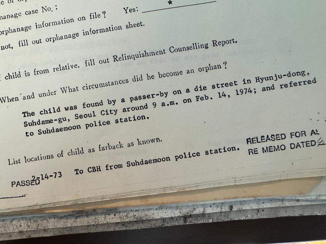 A photograph of a portion of Théoden Janes’s original adoption paperwork, dated March 8, 1974.