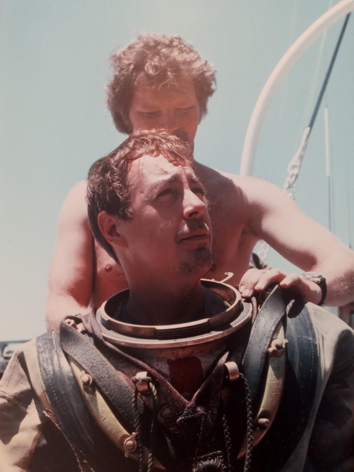 Thomas Burgess, author and avid SCUBA diver, died in Charlotte at the age of 85.