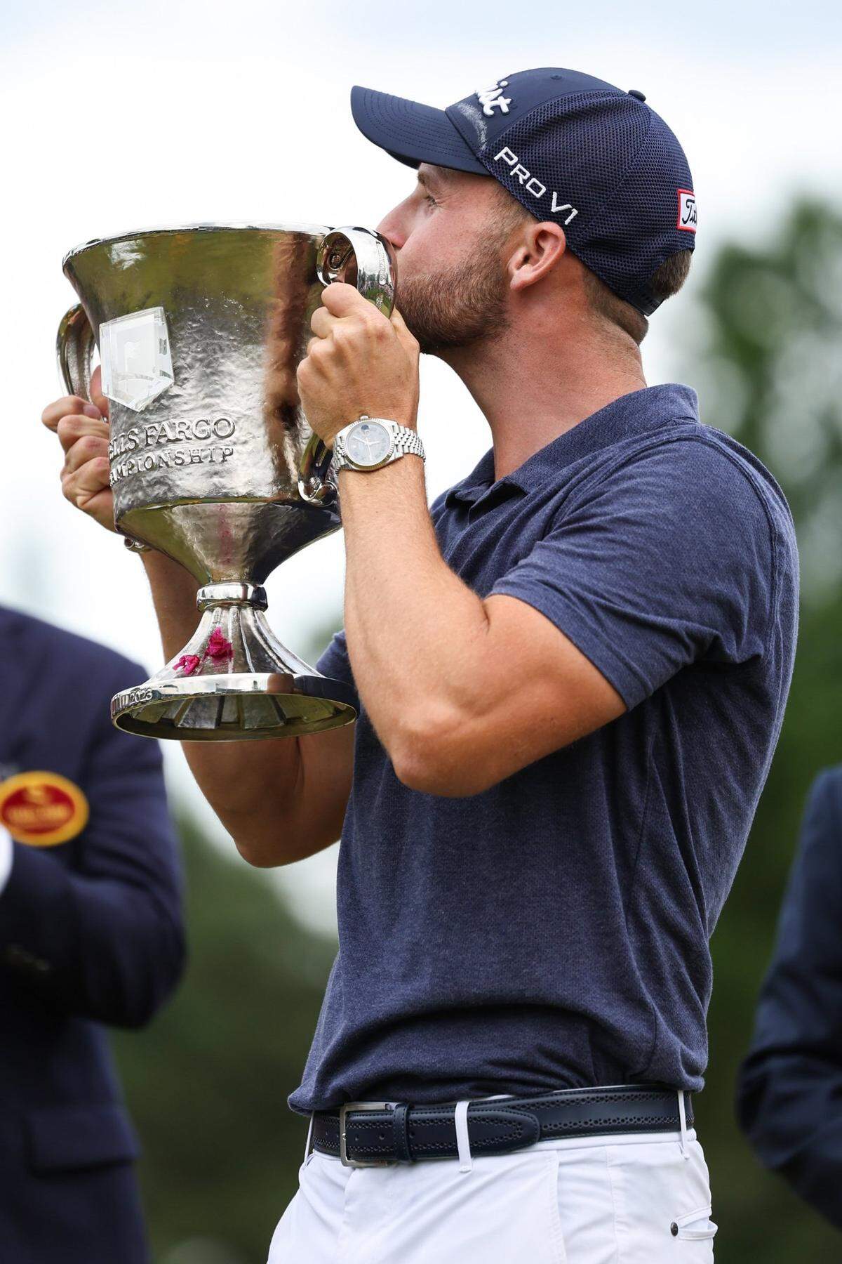 Wyndham Clark kisses the trophy after winning the Wells Fargo Championship on Sunday, May 7, 2023 at Quail Hollow Club. This is Clark’s first major tour win.