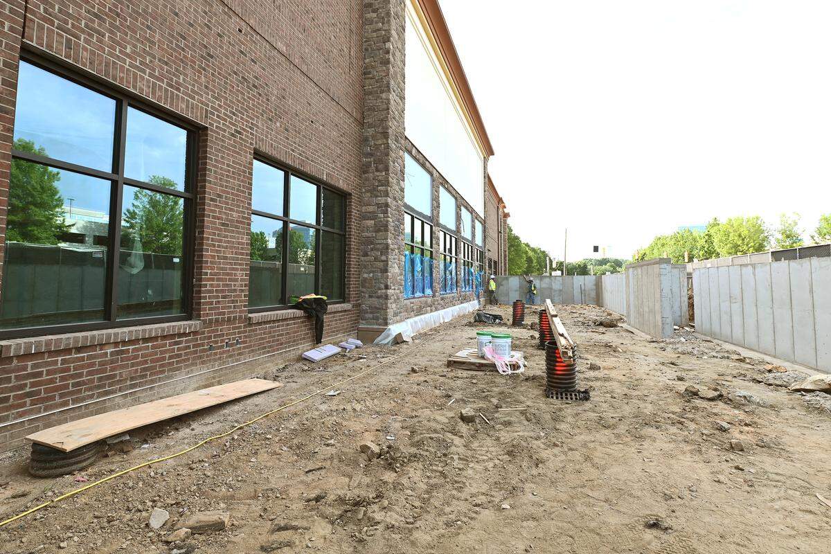 The Wegmans store in Charlotte will have a 4,000-square-foot outdoor patio space with covered seating and a children’s play area, a new concept for the Rochester, NY.-based family-owned grocery chain.