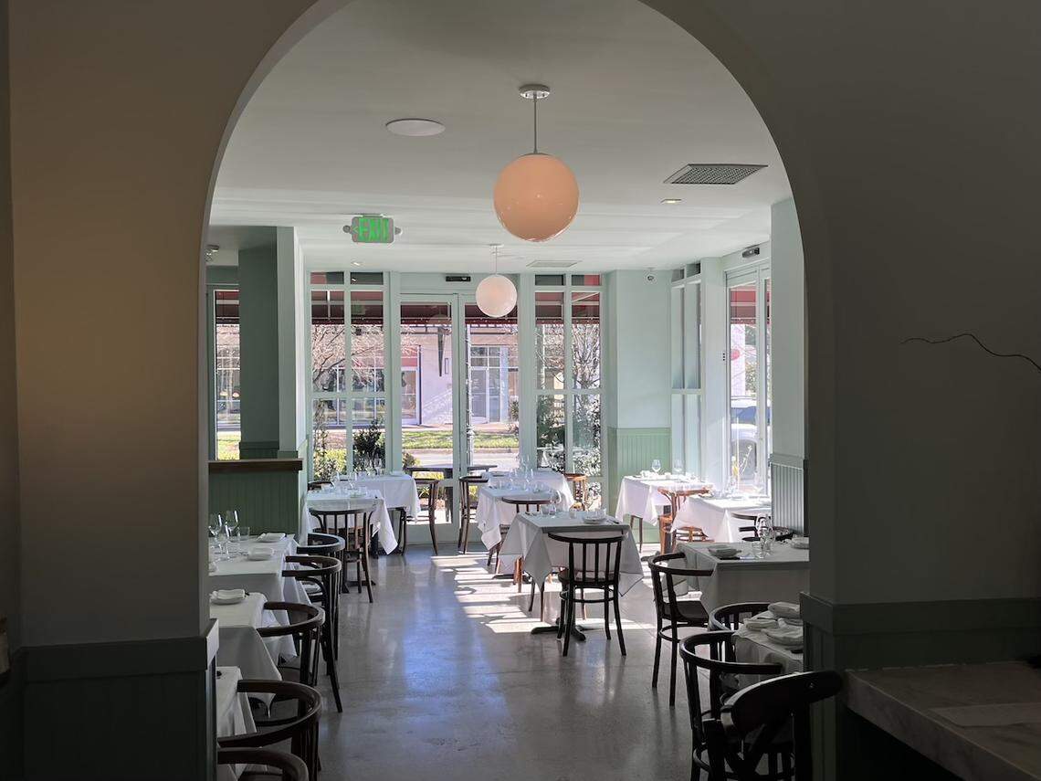 Rada boasts an elegant, somewhat minimal design with snug tables and a white marble bar.