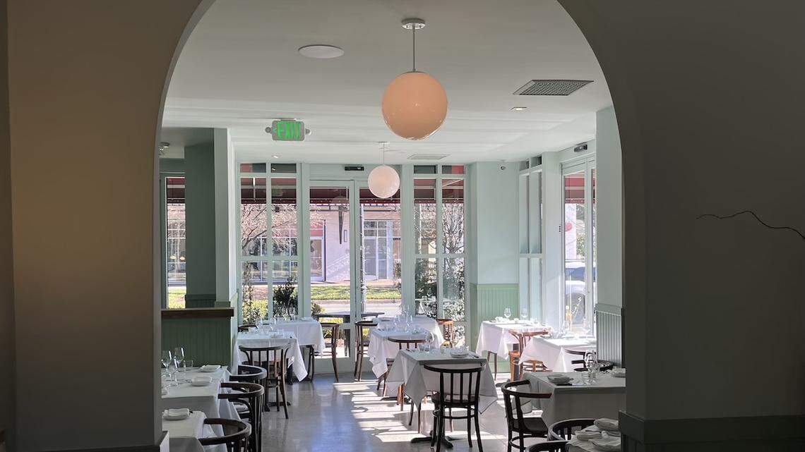 Rada boasts an elegant, somewhat minimal design with snug tables and a white marble bar. 