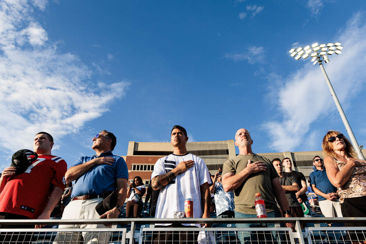 Rugby fans stand for the United States national anthem before the USA v. Zimbabwe match for the inaugural World Rugby Nations Cup on Saturday, July 11, 2026 at the American Legion Memorial Stadium in Charlotte, NC.