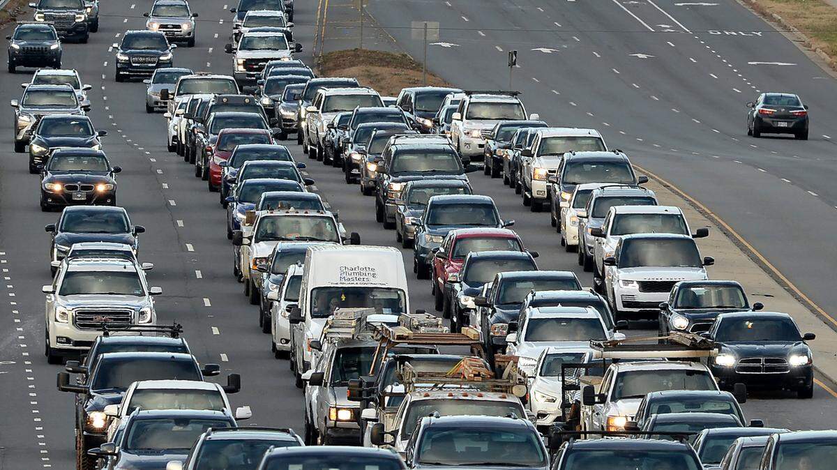 Evening commuters cross over I-485 on Providence Road in Charlotte, NC on Dec. 9, 2021.