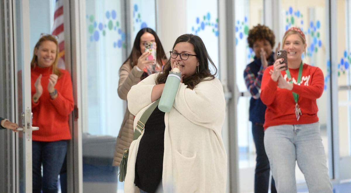 A completely overwhelmed Stephanie Lane, a first grade teacher at Lake Norman Charter was recognized as the statewide Charter School Teacher of the Year. About 600 students attended the surprise event at the school on Thursday, Dec. 11, 2025.