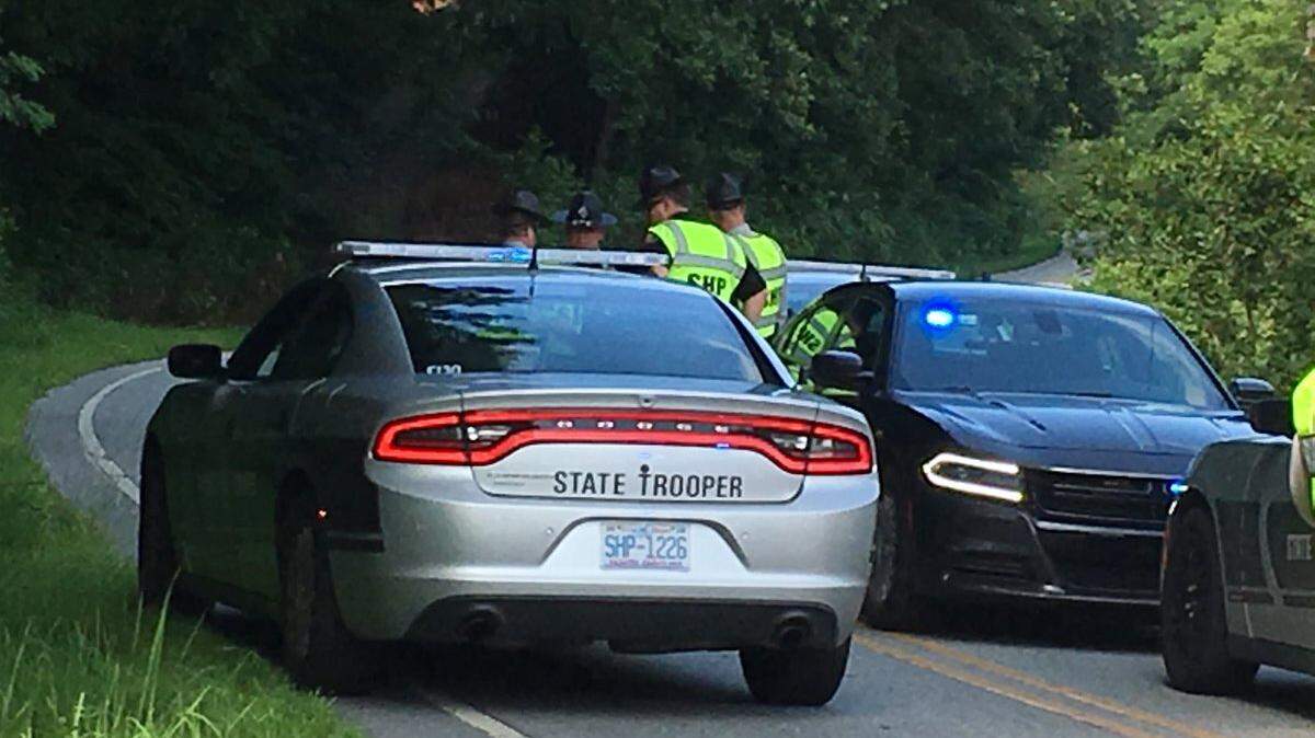 Troopers have blocked the roads near the scene of the shooting Tuesday in Caldwell County