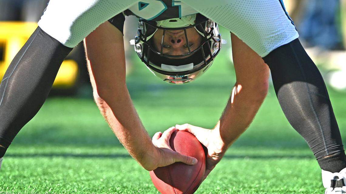 Carolina Panthers long snapper JJ Jansen warms up on the sideline during first half action against the Denver Broncos on Sunday, November 27, 2022 at Bank of America Stadium in Charlotte, NC. Jansen tied former kicker John Kasey for most games played at 221 in franchise history.