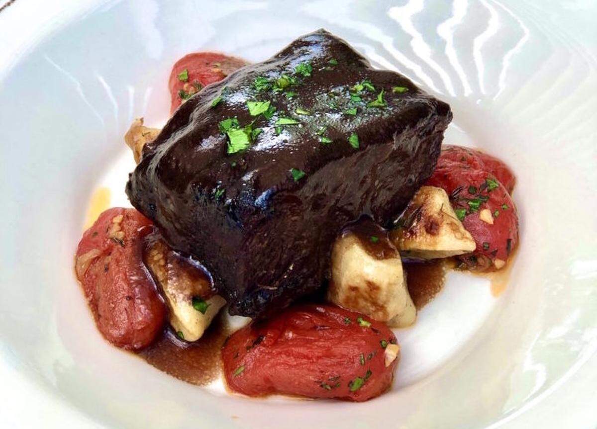 Crepe Cellar’s beef short ribs are served over potato herb gnocchi with roasted tomatoes, shallots and a cabernet reduction.
