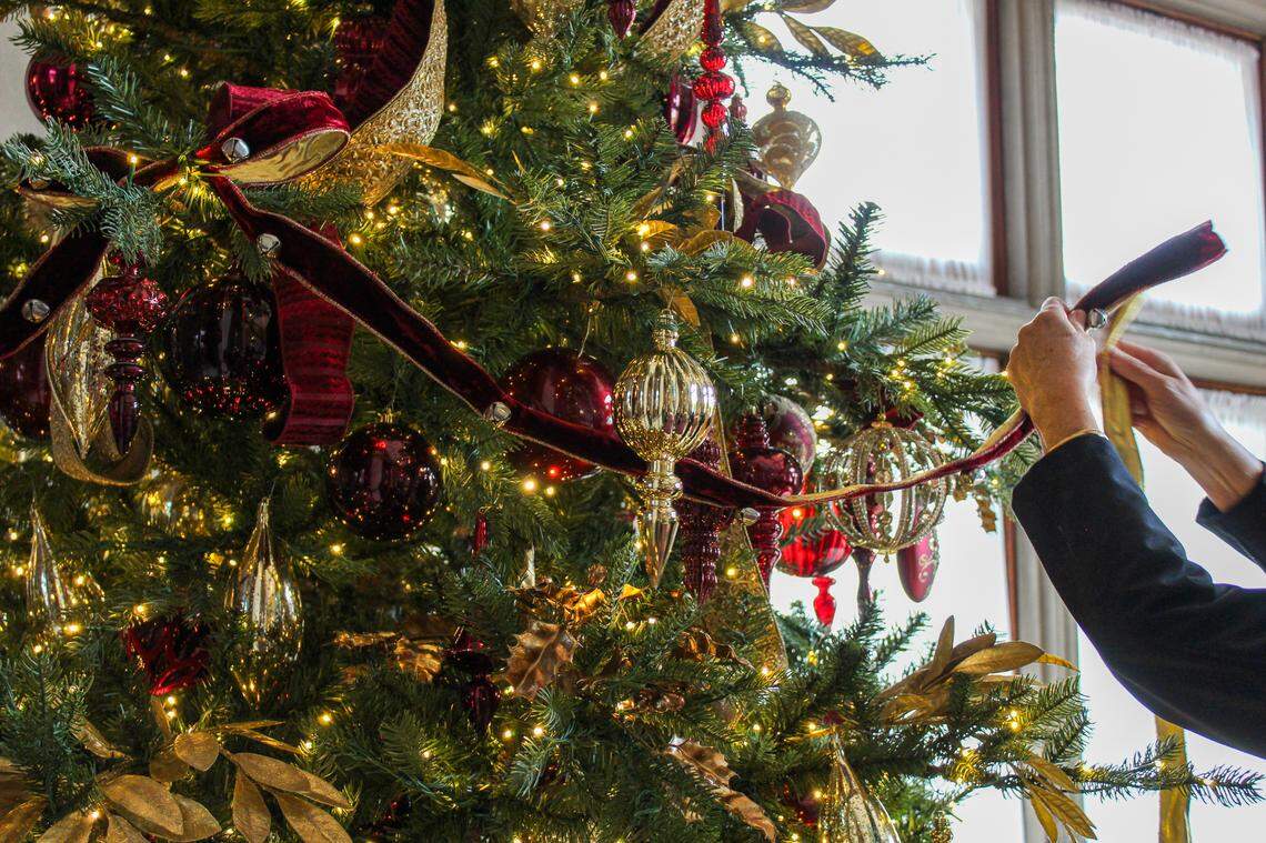 Teams setting up holiday decorations at Biltmore Estate.