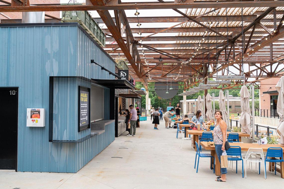 The Keswick Avenue food stalls at Camp North End have outdoor seating available and areas to spread out nearby.