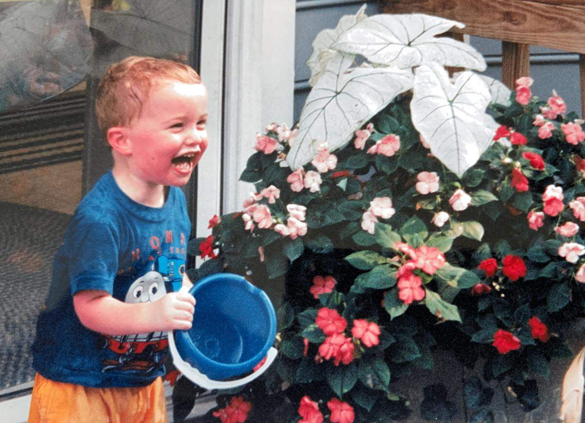 Reed Parlier at age 3. His mother Julie says into his toddler years he had “just that deep, baby belly laugh” — an expression of pure joy.