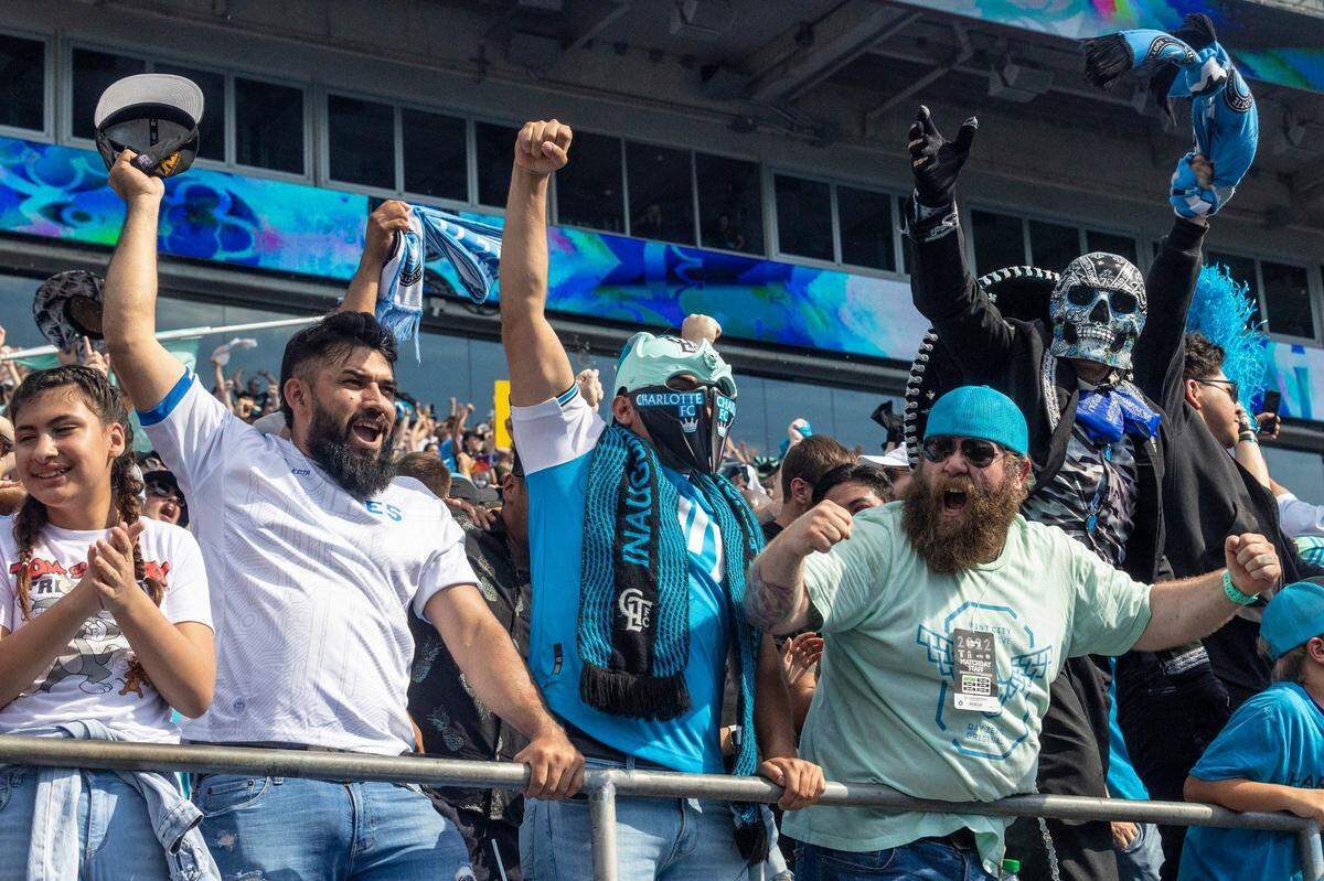 Fans celebrate Charlotte FC’s second goal, securing a win over the New York Red Bulls, during the game at Bank of America Stadium on Saturday, June 11, 2022 in Charlotte. Charlotte FC won, 2-0.