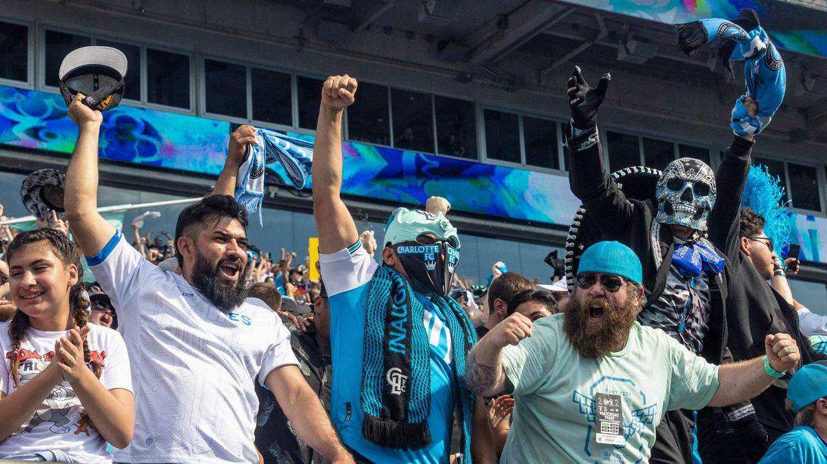 Fans celebrate Charlotte FC’s second goal, securing a win over the New York Red Bulls, during the game at Bank of America Stadium on Saturday, June 11, 2022 in Charlotte, NC. Charlotte FC won, 2-0.