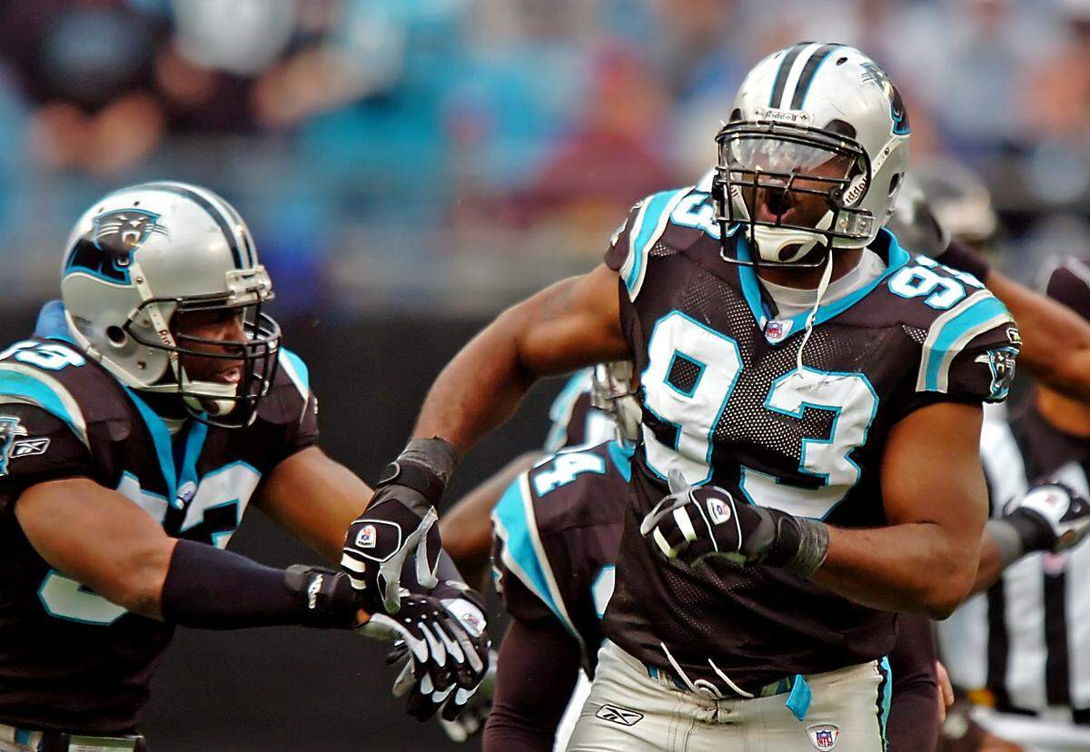 Mike Rucker, a retired star defensive lineman for the Panthers, is suing his longtime financial adviser over claims of financial mismanagement.