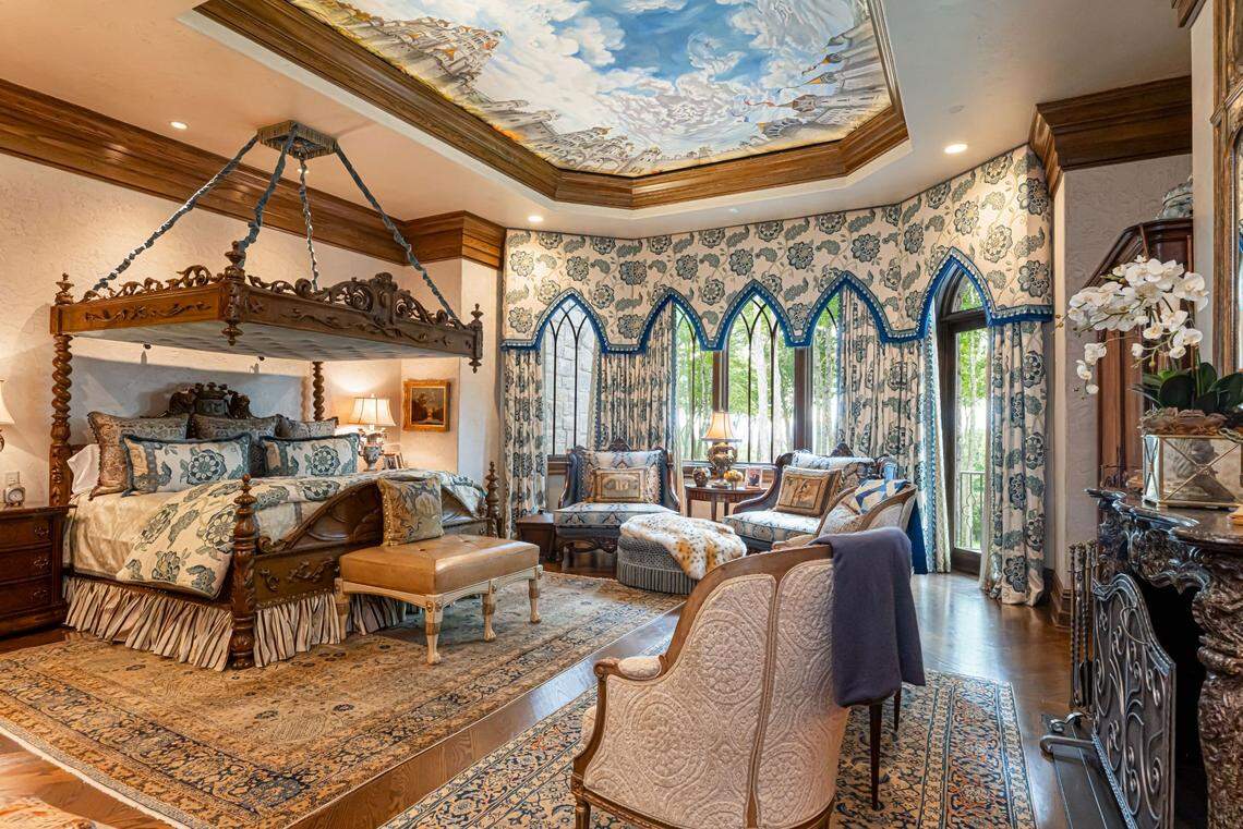 A bedroom of the mansion at 120 Summit Park Drive in Banner Elk looks out to the surrounding mountains.