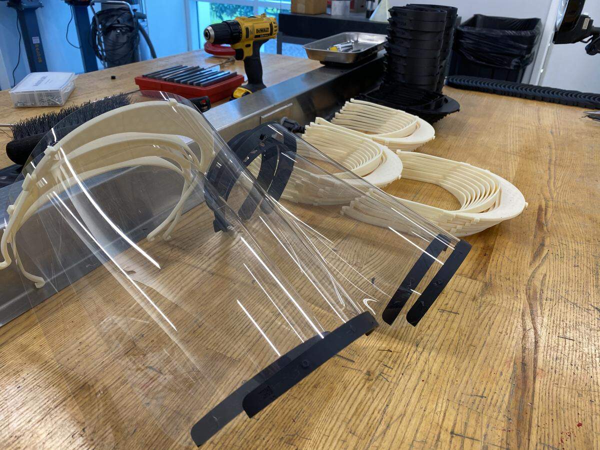 Engineers at the NASCAR Research and Development Center have shifted their manufacturing efforts to producing and assembling face shields for hospitals to combat the coronavirus pandemic. The team delivered 160 face shields to Novant Health on Tuesday.