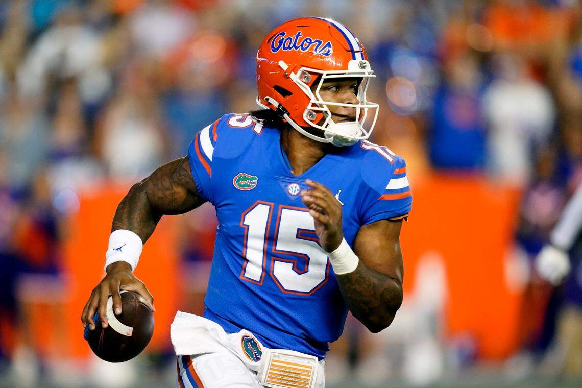Florida quarterback Anthony Richardson looks for a receiver during the first half of an NCAA college football game against LSU, Saturday, Oct. 15, 2022, in Gainesville, Fla. (AP Photo/John Raoux)