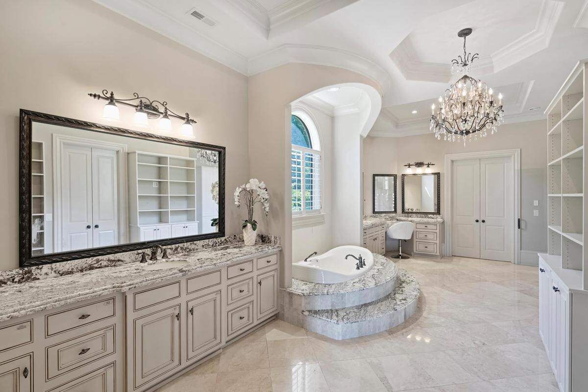 The 10,320-square-foot, Mediterranean-inspired estate has six bedrooms, six full and three half-bathrooms and 1.35 waterfront acres, according to its listing.