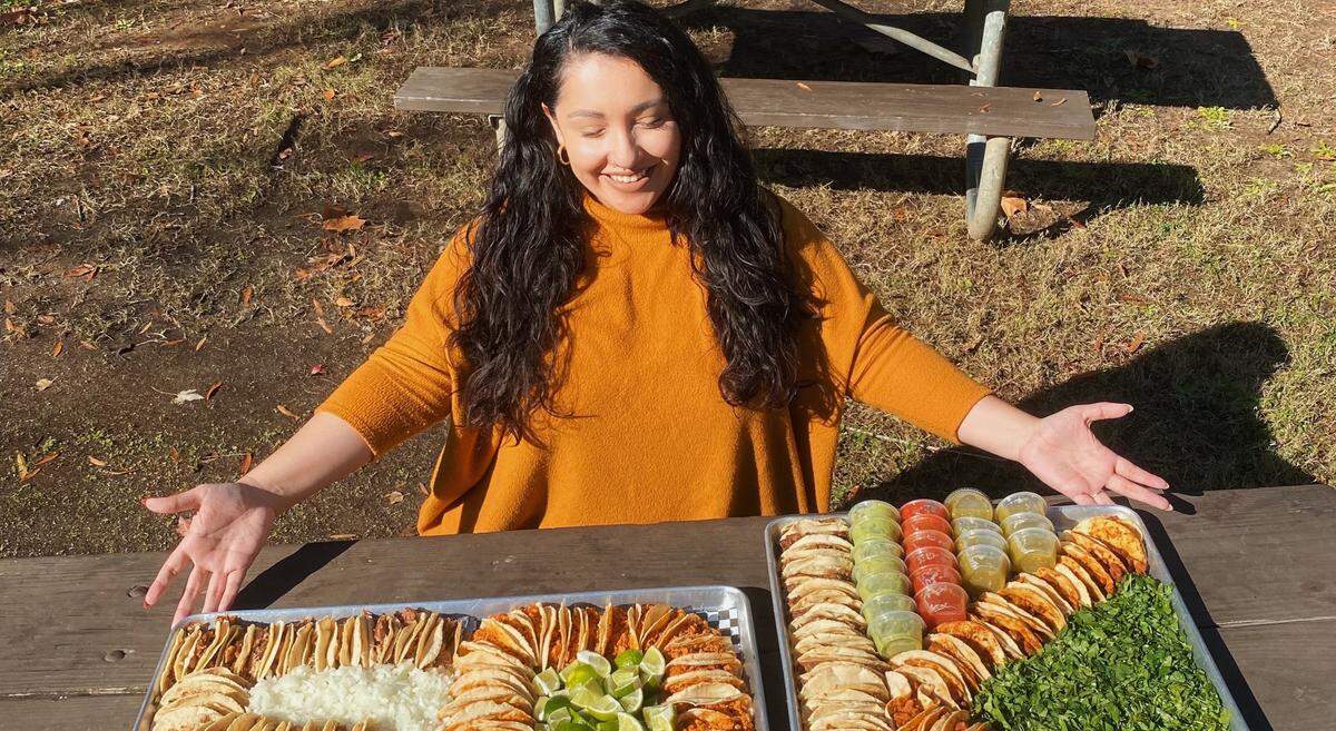 Wynee Bermudez with a spread of tacos from Las Americas in Rock Hill, SC, to celebrate reaching 50,000 followers on TikTok.