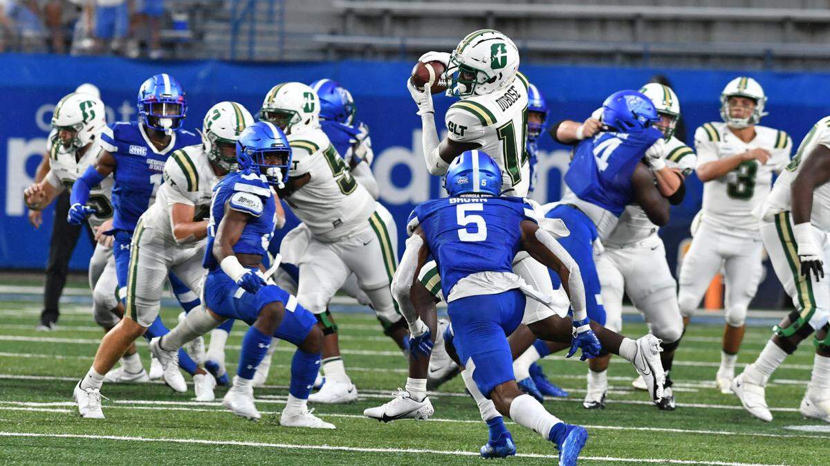 Charlotte receiver Grant DuBose makes a reception against Georgia State on Saturday night.