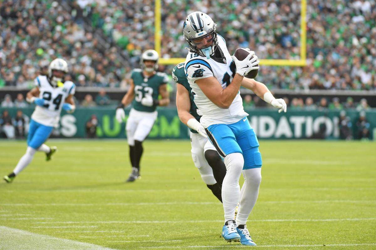 Dec 8, 2024; Philadelphia, Pennsylvania, USA; Carolina Panthers wide receiver Adam Thielen (19) makes a catch against Philadelphia Eagles cornerback Cooper DeJean (33) during the first quarter at Lincoln Financial Field. Mandatory Credit: Eric Hartline-Imagn Images